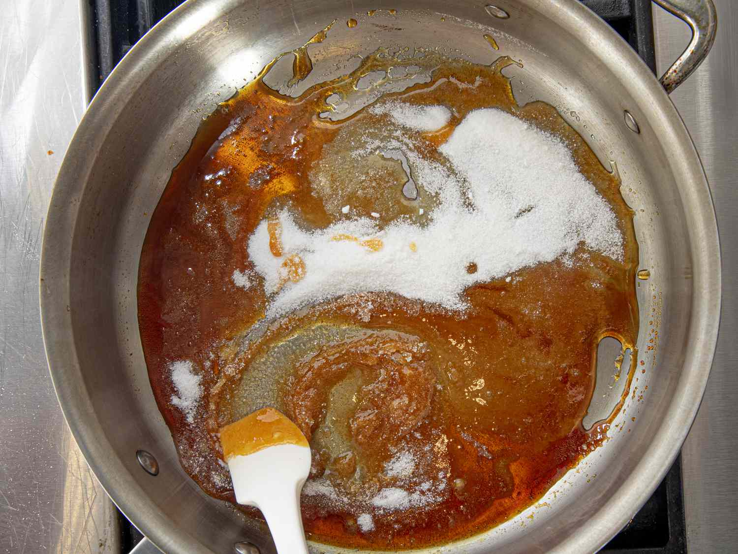 Overhead view of stirring caramel