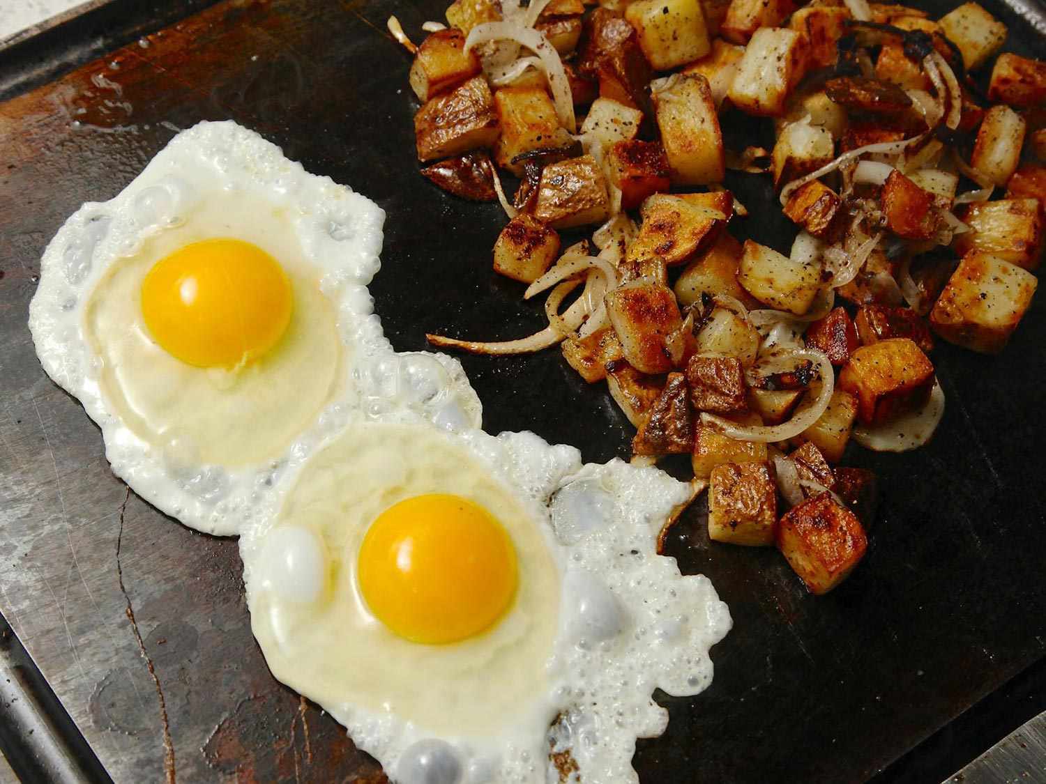 Eggs and hash on the baking steel griddle