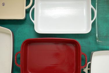 six casserole dishes on a green backdrop