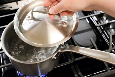 a small saucepan boiling water on a stovetop