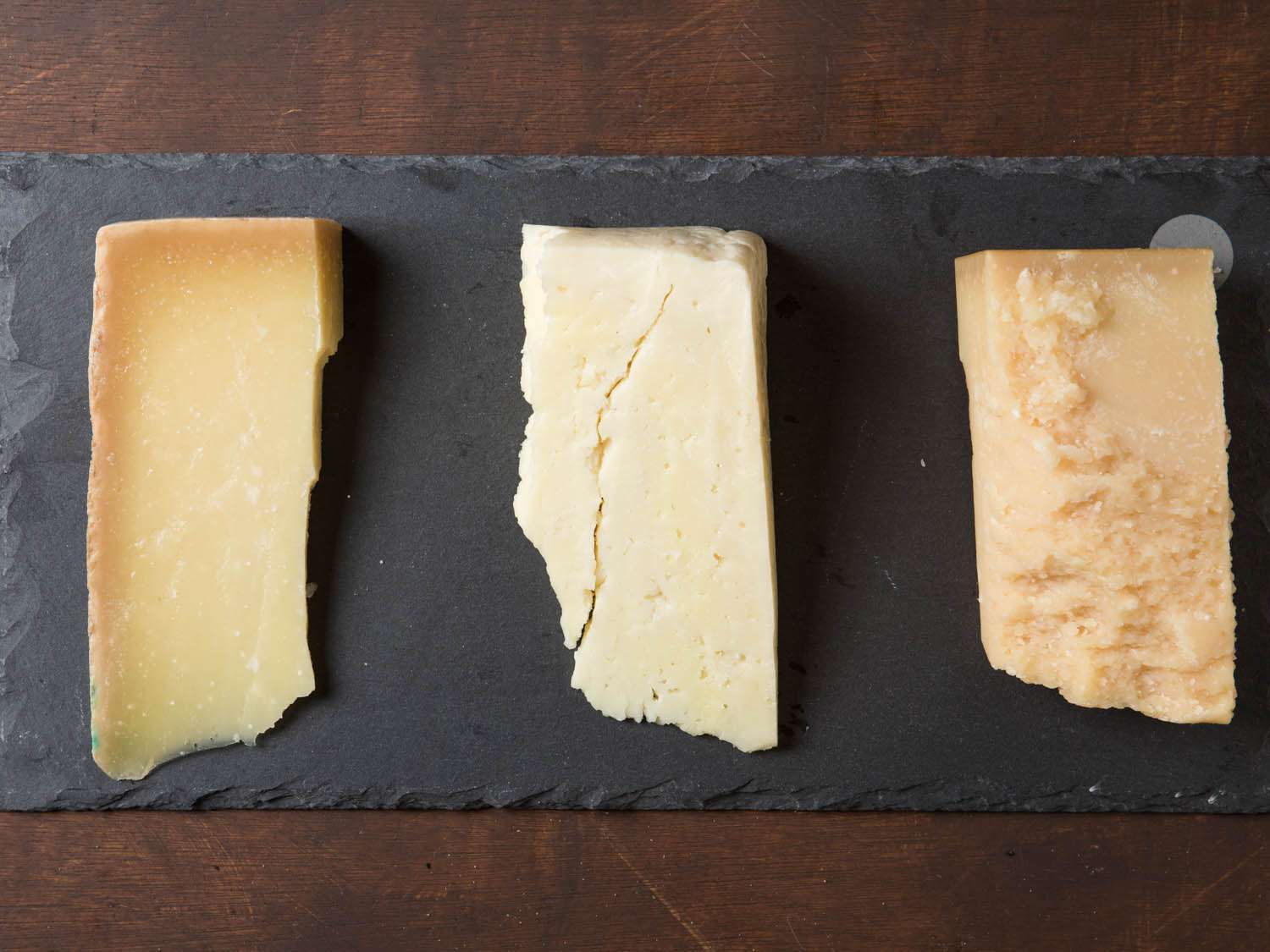 Cheeses called for in pesto recipes, from left: Pecorino Fiore Sardo, Pecorino Romano, and Parmigiano-Reggiano