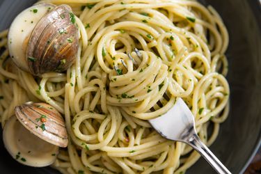 Spaghetti tossed in a sauce with clams, garlic, white wine and chile flakes.