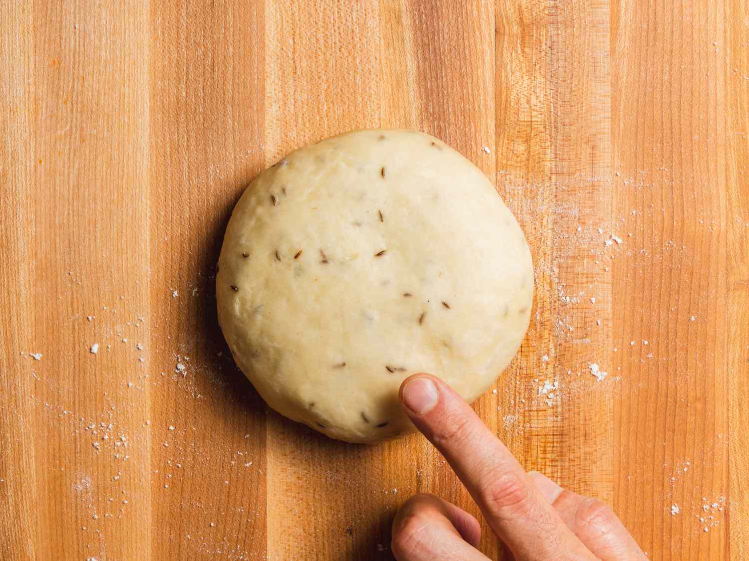 Rested samosa pastry dough on a work surface