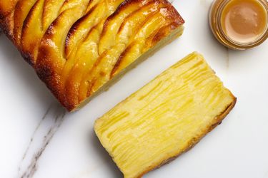 A slice of finely-layered apple custard cake known as Gâteau invisible aux pommes