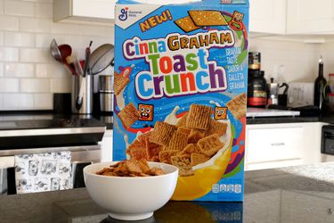 Box of General Mills' Cinnagraham Toast Crunch cereal on a kitchen counter