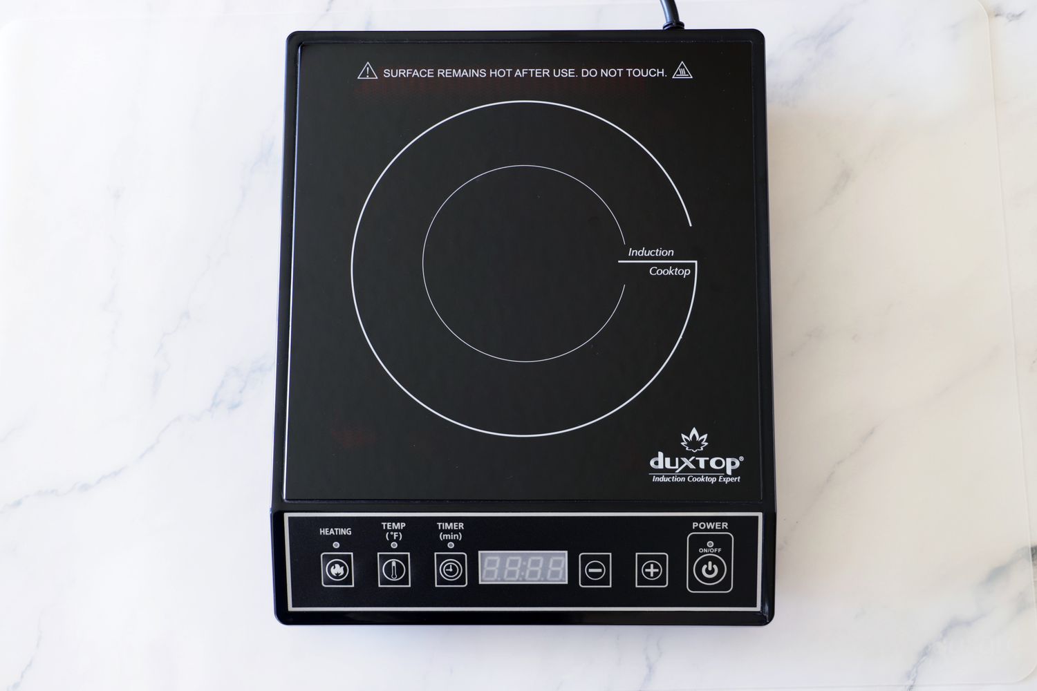 a photo of the duxtop induction burner on marble