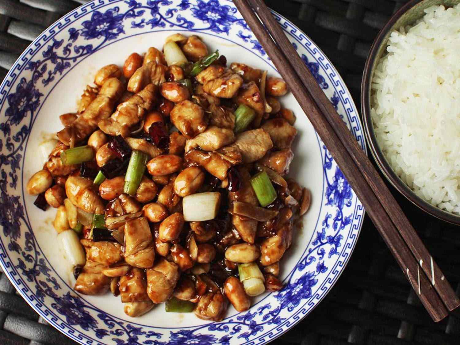 Kung pao chicken on serving plate.