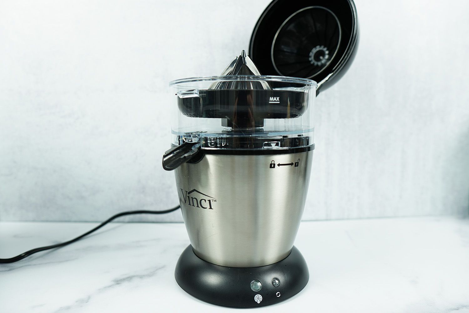a Vinci electric citrus juicer with its hinged lid open
