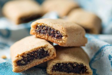 Homemade Fig Newtons on a kitchen towel