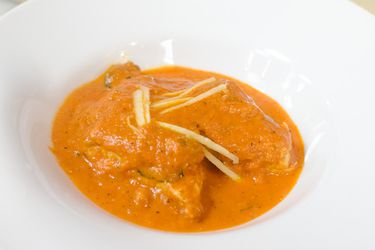 A bowl of homemade chicken tikka makhani, also known as butter chicken