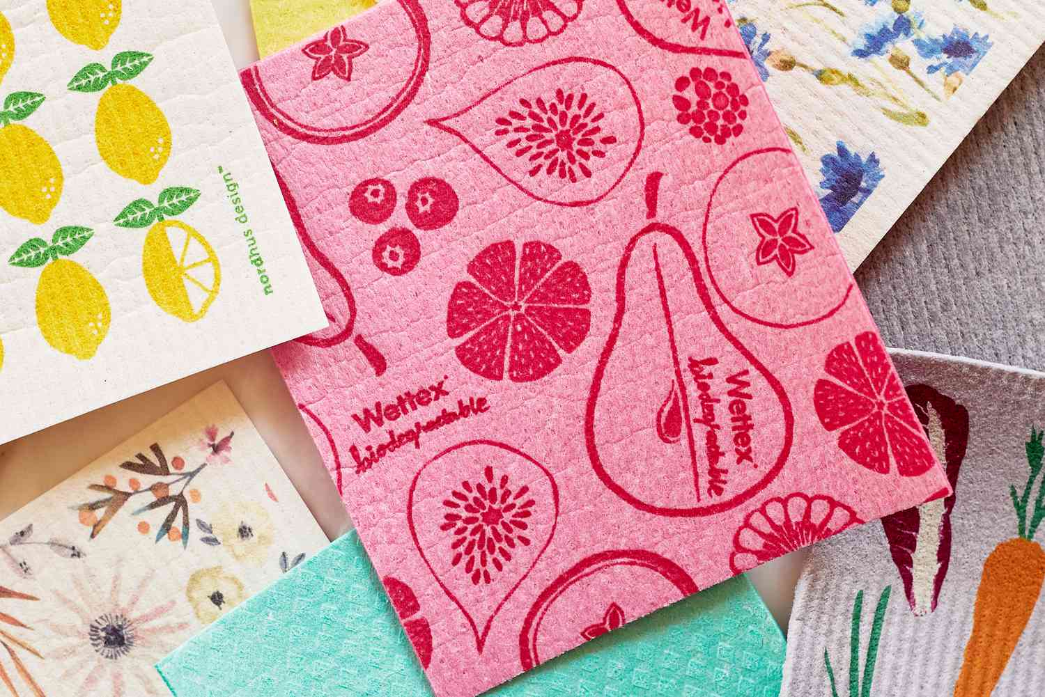 a closeup look at a pink, patterned Swedish dishcloth