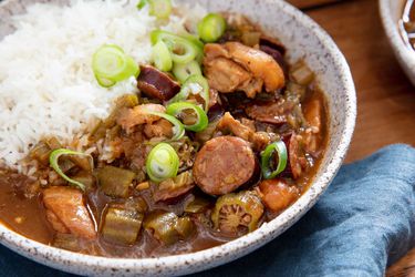 Bowl of Cajun gumbo with chicken, okra, and andouille sausage. Served with rice.