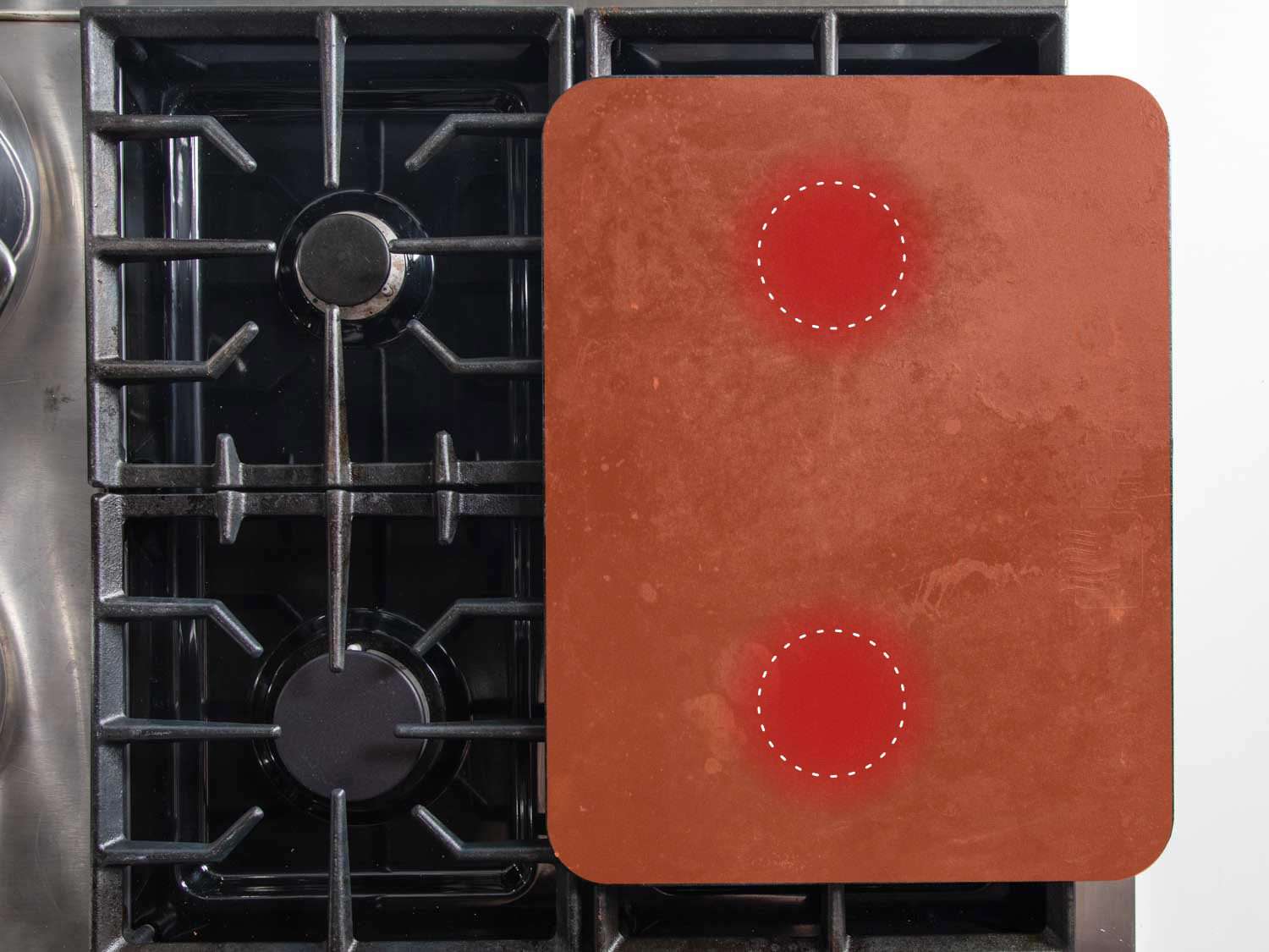顶视图的插图烘焙钢加热两个燃烧器在中火煨多个锅的食物。