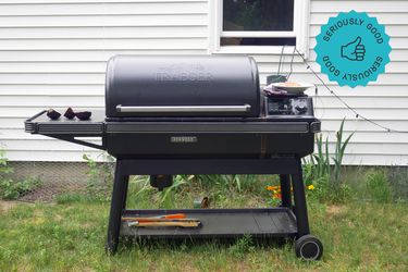 Traeger in front of house