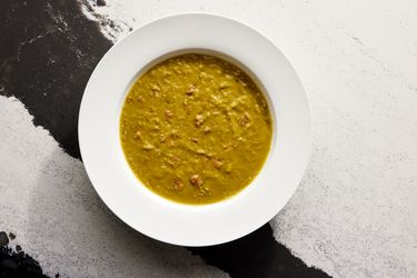 Overhead view of split pea and hand soup