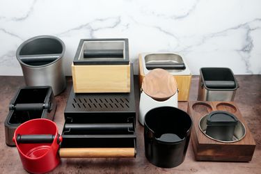 an array of espresso knock boxes