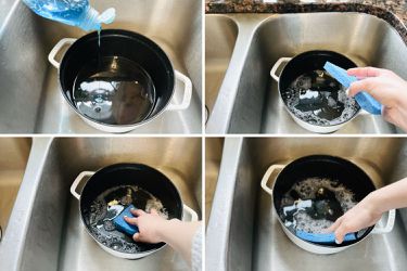 一个人用洗洁精、水和海绵擦洗荷兰式烤箱的内部。
