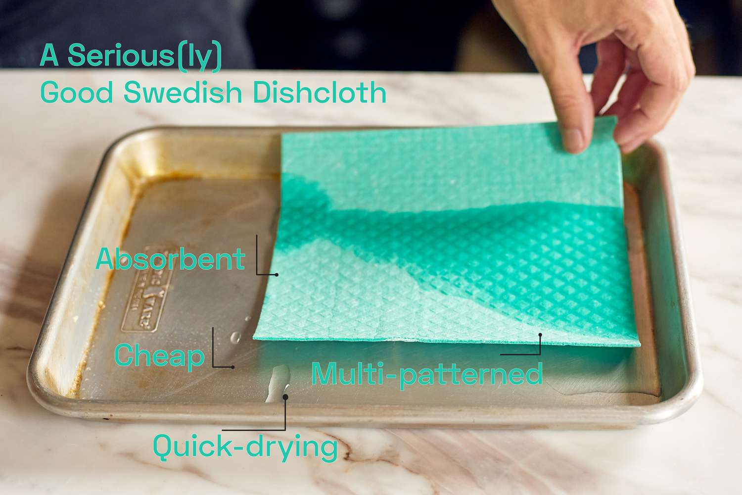 A swedish dishcloth being soaked in water