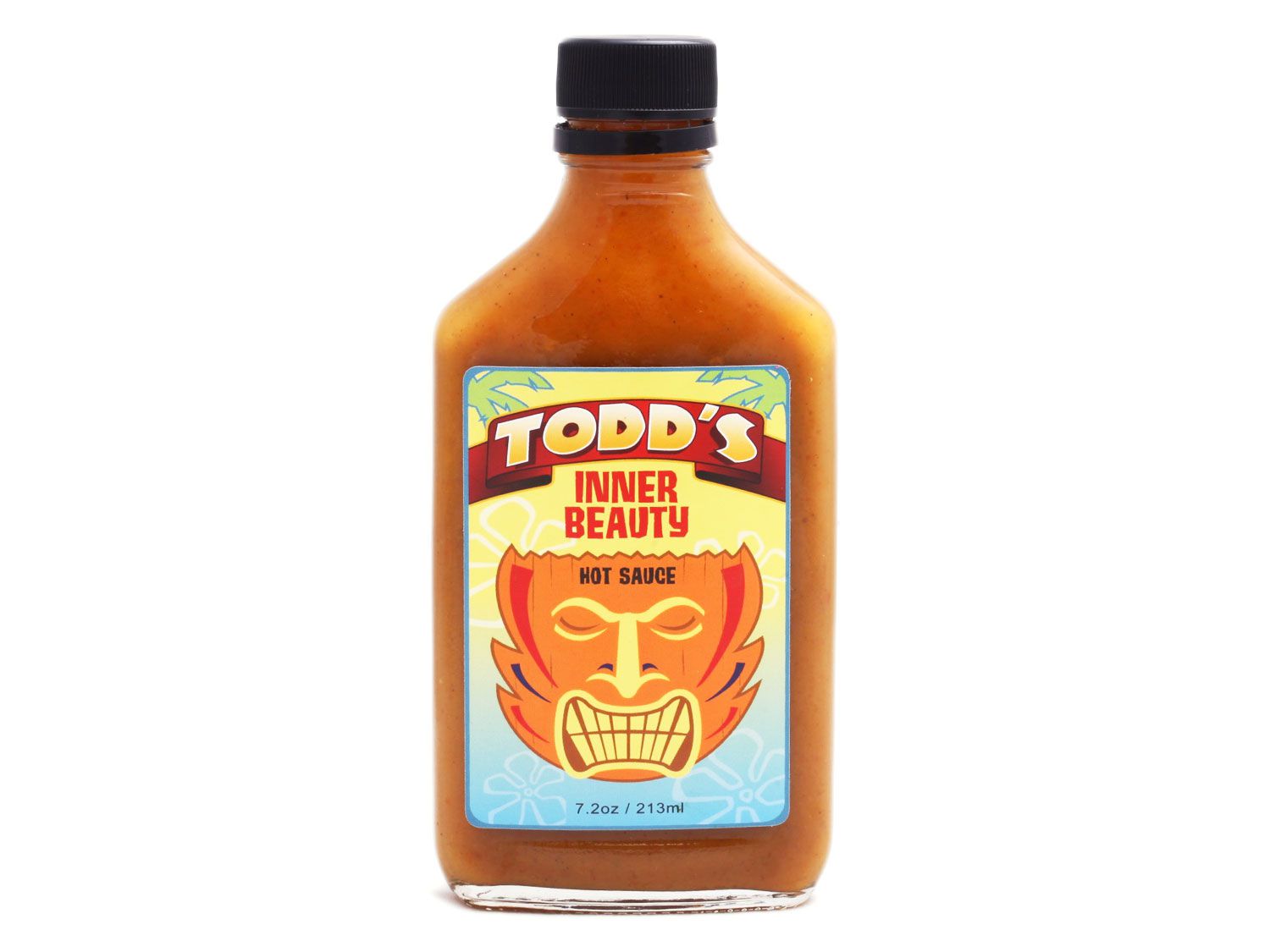 一瓶陶德的内在美辣酱，标签上有一个波利尼西亚风格的面具
