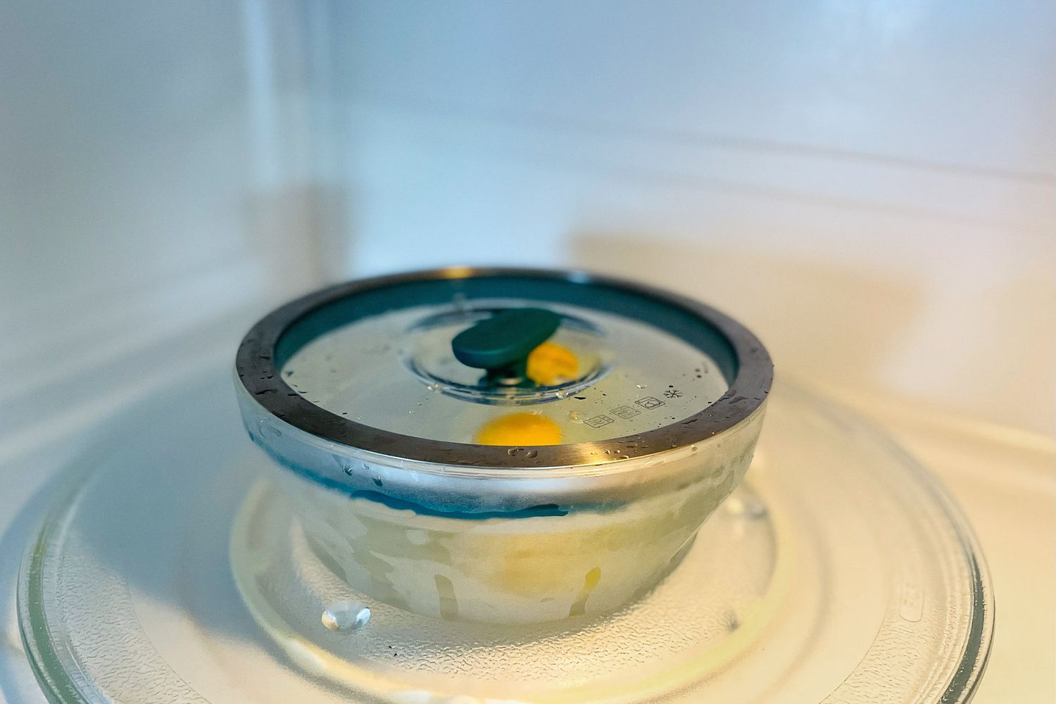 An Anyday dish in the microwave with its lid on