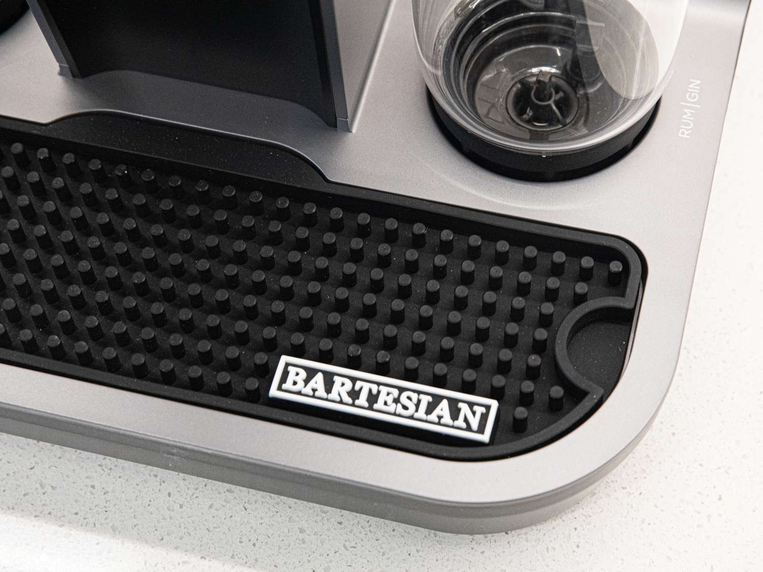 A closeup look at the rubber bar mat of the Bartesian