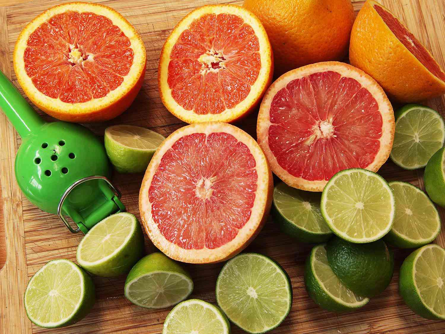 Cut open grapefruits and limes with a juice squeezer.
