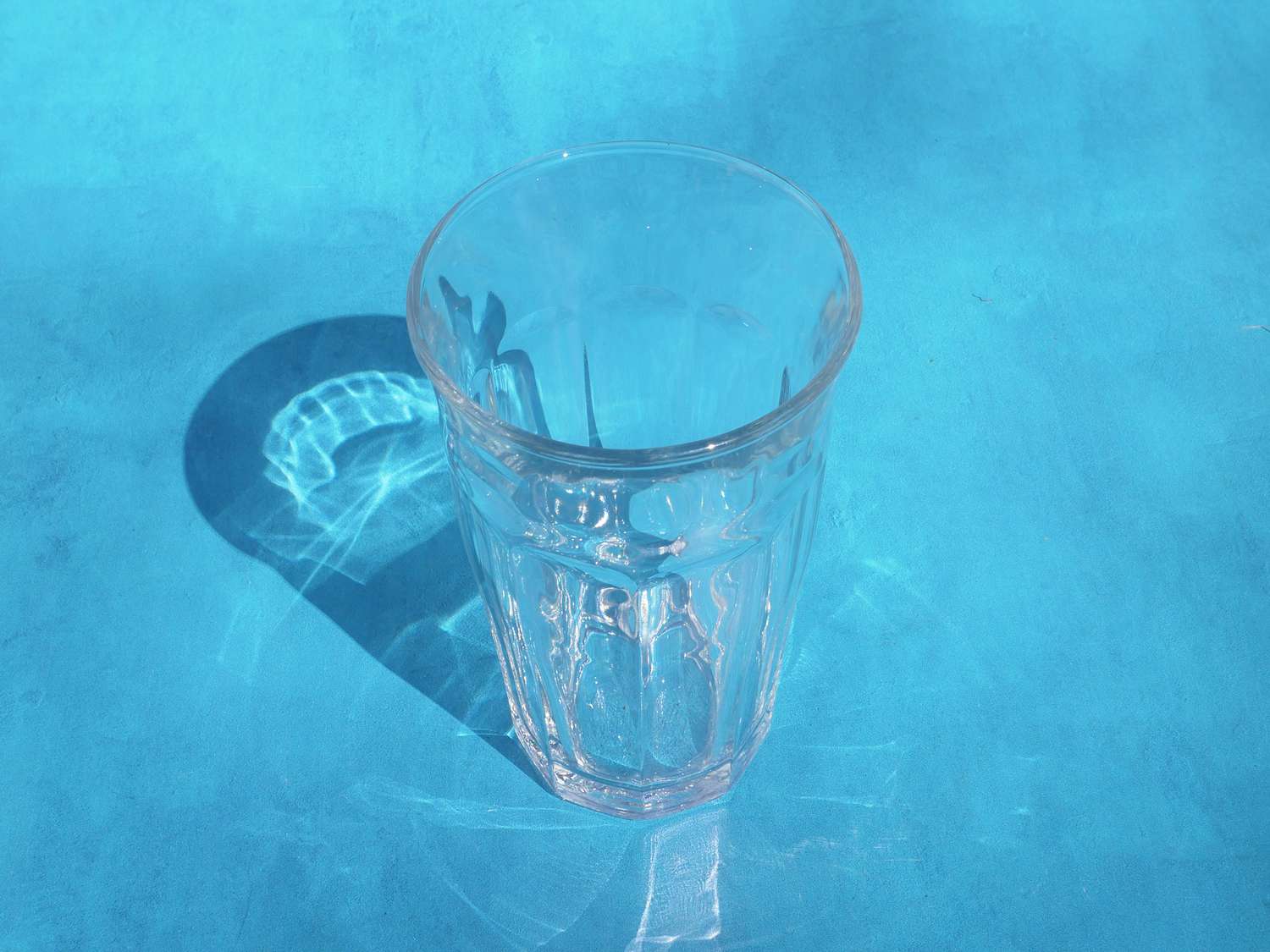 the duralex glass on a blue backdrop