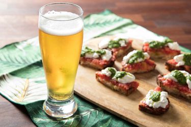 20180913-beer-pairings-crisp-clean-beer-pantry-burrata-tomato-pesto-toast-vicky-wasik-beer-in-glass