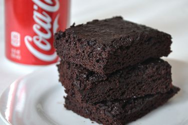 A stack of brownies made with Coca-Cola in place of eggs and oil.