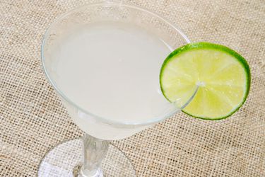 The El Floridita Daiquiri in a cocktail glass with a lime wheel on the rim.