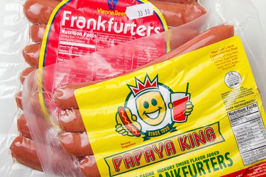 Packages of Vienna Beef hot dogs and Sabrett hot dogs.