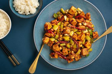 Overhead of a plate of crispy vegan kung pao tofu