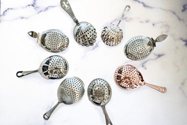 julep strainers on marble countertop