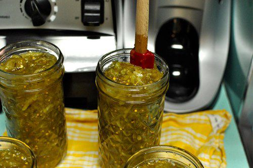 Pickle relish in a jar, ready to can.