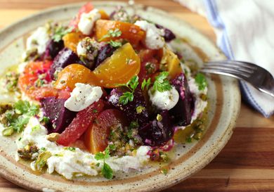 A colorful salad of beets and citrus with pistachio dressing