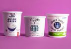 粉色背景下的一桶我们最喜欢的希腊酸奶
