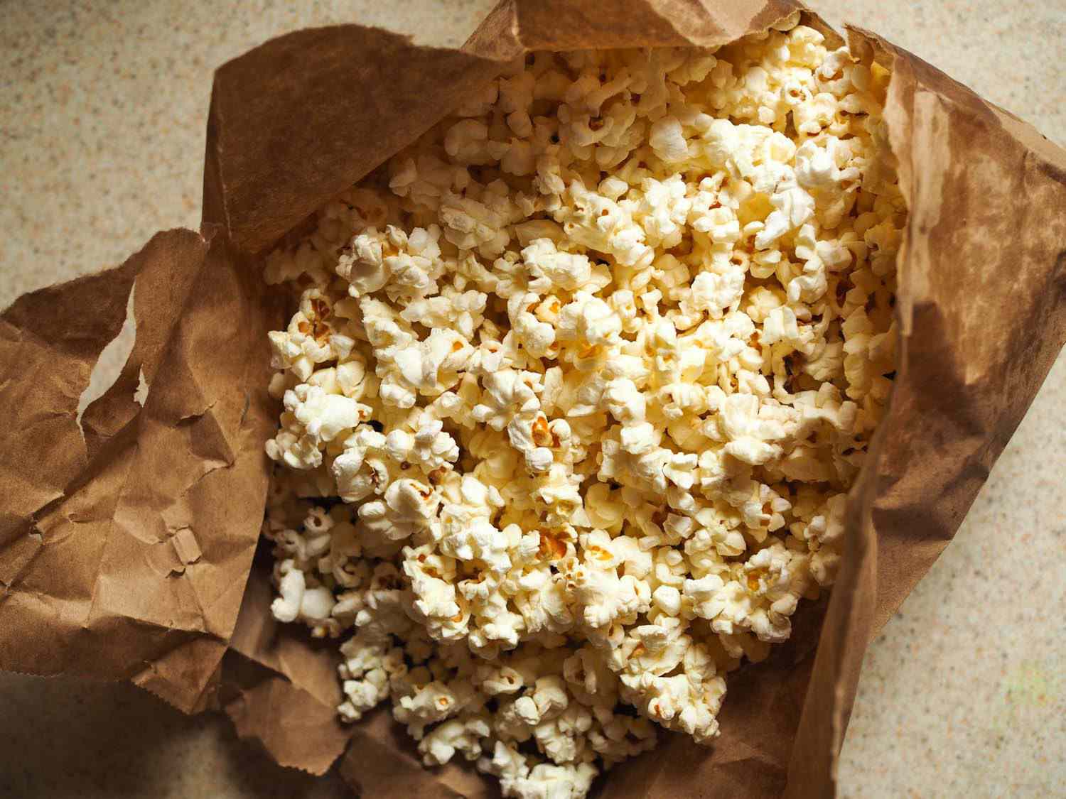 Popcorn in a brown paper bag