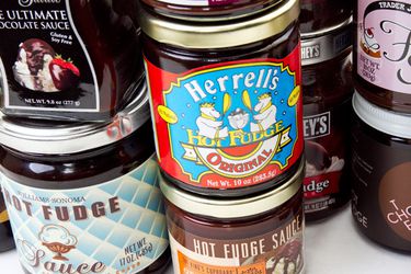 Jars of different brands of hot fudge sauces